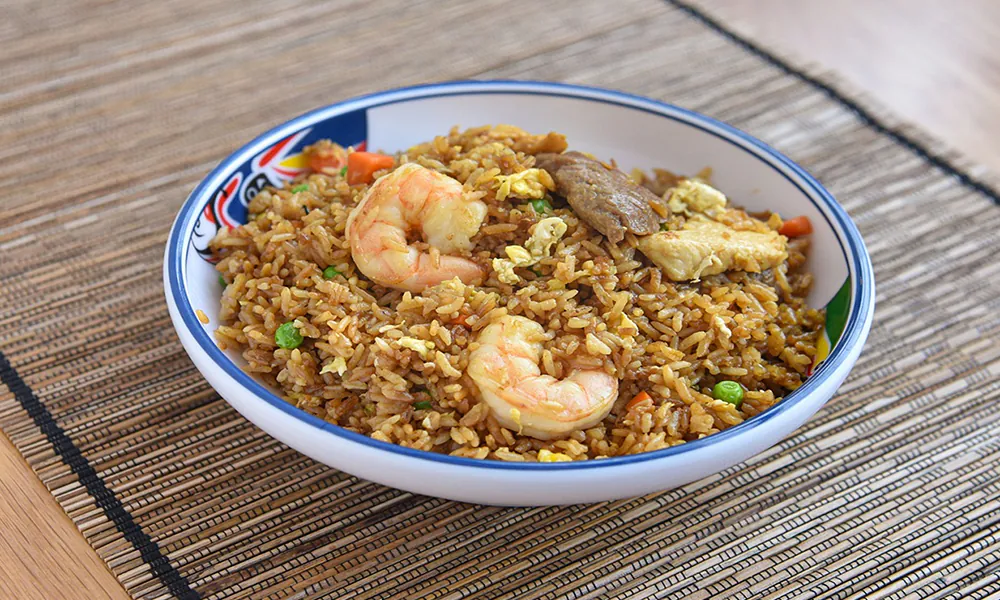 Spicy kimchi fried rice with diced pork and fresh green onions at Golden Dragon Express, a Chinese Restaurant in San Antonio